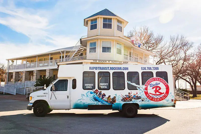 Rockin' R River Outfitters group shuttle bus in New Braunfels, Texas